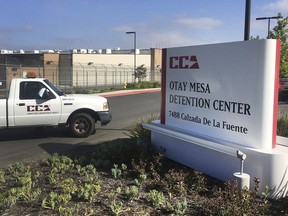 FILE - In this June 9, 2017, file photo, a vehicle drives into the Otay Mesa detention center in San Diego, Calif. The American Civil Liberties Union filed a class-action lawsuit Friday March 9, 2018, accusing the U.S. government of broadly separating immigrant families seeking asylum. The lawsuit follows action the ACLU took in the case of a Congolese woman and her 7-year-old daughter, who the group said was taken from her mother "screaming and crying" and placed in a Chicago facility. While the woman was released Tuesday from the San Diego detention center, the girl remains in the facility 2,000 miles away.