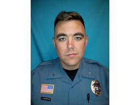 This undated photo released by Clinton Police Department shows officer Christopher Ryan Morton. Morton was fatally shot and two other officers injured while trying to apprehend the suspect after responding to a 911 call at a Missouri residence on Tuesday night, March 6, 2018. A SWAT team entered the home early Wednesday but found the suspect dead. (Clinton Police Department via AP)