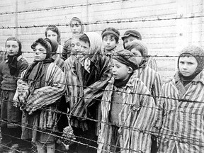 Children photographed at the Auschwitz concentration camp after its liberation by the Red Army, January, 1945.