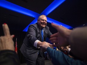 Ontario PC Leader Doug Ford greets supporters after holding a unity rally in Toronto on Monday, March 19, 2018.