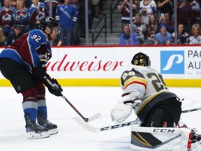 Colorado Avalanche left wing Gabriel Landeskog, left, scores the winning goal past Vegas Golden Knights goaltender Marc-Andre Fleury in the shootout session of an NHL hockey game Saturday, March 24, 2018, in Denver. Colorado won 2-1.
