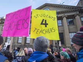 Students and parents protest outside the legislature in Halifax on Monday, Dec. 5, 2016.A commission is set to release its long-awaited report today on classroom inclusion in Nova Scotia.