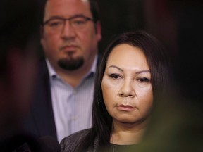 Grand Chief Sheila North Wilson speaks to media as Derek Nepinak, grand chief of the Assembly of Manitoba Chiefs, listens in Winnipeg, Friday, March 18, 2016.&ampgt; A request for a two-year extension from the national inquiry into missing and murdered Indigenous women and girls is being met with a mixed response from First Nations leaders across Canada.