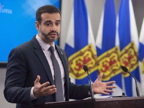 Nova Scotia Education Minister Zach Churchill speaks during a press conference in Halifax on Wednesday, January 24, 2018. Nova Scotia's seven English language school boards will be dissolved March 31 under proposed legislation tabled Thursday.