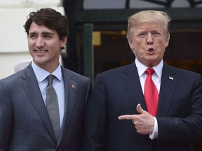 U.S. President Donald Trump boasted in a fundraising speech in Missouri on Wednesday that he made up facts about trade in a meeting with Prime Minister Justin Trudeau, according to a recording of the comments obtained by The Washington Post. Prime Minister Justin Trudeau is greeted by U.S. President Donald Trump as he arrives at the White House in Washington, D.C., on October 11, 2017.