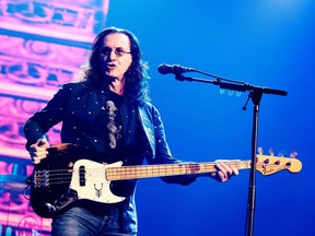 Geddy Lee of the band Rush performs in concert at the Wells Fargo Center on Thursday, June 25, 2015, in Philadelphia. Geddy Lee will usher the Barenaked Ladies, and former bandmate Steven Page, into the Canadian Music Hall of Fame on Sunday's Juno Awards broadcast.