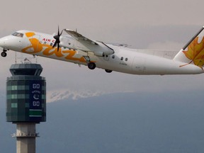 Transport Canada says it believes excessive de-icing fluid was the cause of a fire last month aboard an Air Canada plane in Western Canada. An Air Canada Jazz De Havilland DHC-8 takes off at Vancouver International Airport in Richmond, B.C., on Monday May 30, 2011.