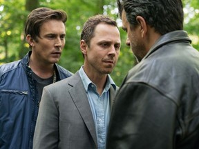 Giovanni Ribisi, centre, is shown in the the television series Sneaky Pete in this undated handout photo.