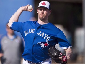 Toronto Blue Jays pitcher John Axford pitches at spring training in Dunedin, Fla. on Thursday, February 15, 2018. Axford was struggling through single-A in 2009 when the Milwaukee Brewers made a suggestion that changed his career path.