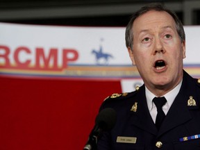 RCMP Assistant Commissioner of the Lower Mainland Peter German speaks during a news conference at RCMP headquarters in Surrey, B.C., on Saturday April 4, 2009. Former RCMP deputy commissioner Peter German has been appointed by the province to review its policies that fight money laundering, and based on his findings David Eby says there are specific concerns he plans to raise with the House of Commons finance committee in Ottawa on Tuesday.THE CANADIAN PRESS/Darryl Dyck