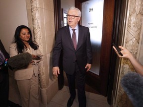 NDP leader and former premier Greg Selinger speaks with media at the Legislature in Winnipeg, Wednesday, April 20, 2016, the day after his party was defeated by the PC party with a majority. Former Manitoba premier Greg Selinger walked out of the Manitoba legislature for a final time Wednesday after 18 years as a provincial politician.