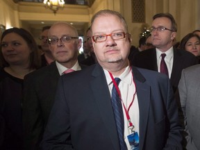 Manitoba Health Minister Kelvin Goertzen and other provincial health ministers wait to speak as a group before a meeting with the federal finance and health ministers in Ottawa, Monday December 19, 2016. The Manitoba government plans to ban the smoking of cannabis in most public places including parks and beaches. Health Minister Kelvin Goertzen introduced a bill today that would set down strict guidelines for when recreational cannabis becomes legal this summer