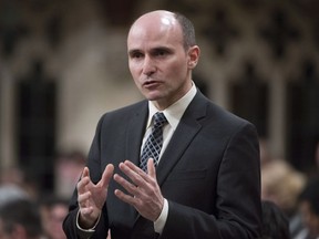 Families, Children and Social Development Minister Jean-Yves Duclos rise in the House of Commons in Ottawa on Friday, May 6, 2016. The federal minister in charge of a decade-long housing strategy says the plan will be based on a "right to housing" as he faces criticism the Liberals are watering down the pledge.