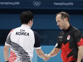 After a four-year run with the Calgary team, second Brent Laing is departing to join a new-look Team John Epping next season. Canada's Brent Laing, right, shakes hands with South Korea's Oh Eunsu during their men's curling match at the 2018 Winter Olympics in Gangneung, South Korea, Friday, Feb. 16, 2018. Canada won.