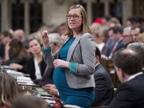 Democratic Institutions Minister Karina Gould rises in the House of Commons in Ottawa, Wednesday, January 31, 2018. Democratic Institutions Minister Karina Gould has made history, twice over, with the birth of a baby boy this week.