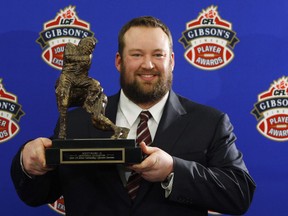Scott Flory, of the Montreal Alouettes, holds his trophy for the CFL Most Outstanding Lineman during the 2009 Gibson's Finest Players Awards in Calgary on November 26, 2009. Punter Hank Ilesic, stalwart offensive lineman Scott Flory, late centre/linebacker Tom Hugo, defensive lineman Brent Johnson and defensive back Barron Miles will be inducted as players in the Canadian Football Hall of Fame. Former quarterback Frank Cosentino was named as a builder while Paul Brule was honoured for his outstanding amateur career.