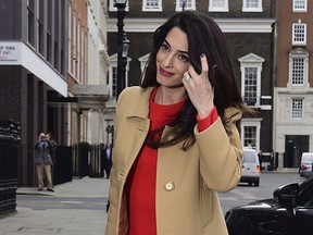 Amal Clooney arrives at Chatham House in London, Wednesday March 29, 2017, to give a speech on war crimes in Syria and Iraq. Renowned international human rights lawyer Amal Clooney is slated to attend Toronto's Luminato arts festival in June.