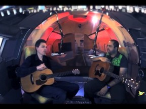 Halifax musician Asif Illyas (right) hosts the online talk show "Live On The Flight Deck" in a home-built flight simulator. Here he is shown interviewing musician Joel Plaskett (left). THE CANADIAN PRESS/HO-Asif Illyas MANDATORY CREDIT