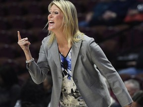 Central Florida head coach Katie Abrahamson-Henderson calls to her team during the first half of an NCAA college basketball game against South Florida in the American Athletic Conference tournament semifinals at Mohegan Sun Arena, Monday, March 5, 2018, in Uncasville, Conn.