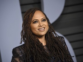 FILE - In this March 4, 2018, file photo, Ava DuVernay arrives at the Vanity Fair Oscar Party in Beverly Hills, Calif. DuVernay is scheduled to be a guest at the 20th annual Ebertfest in Champaign, Ill. The University of Illinois said Monday, March 12, 2018, that the Oscar-nominated director of "Selma" and "A Wrinkle in Time" will attend the film festival, which honors the late Chicago Sun-Times movie critic Roger Ebert.
