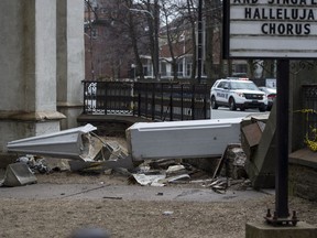 A steeple from St. Matthew's United Church lay smashed on the ground after being toppled by high winds in Halifax on Wednesday, March 14, 2018.