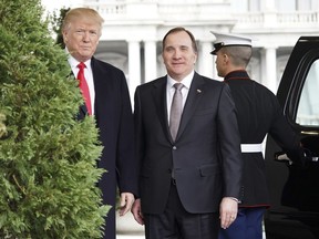 President Donald Trump poses for a photo with Swedish Prime Minister Stefan Lofven outside the West Wing of the White House, Tuesday, March 6, 2018, in Washington.