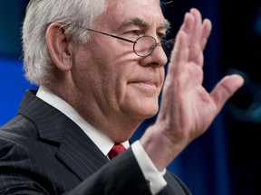Secretary of State Rex Tillerson waves goodbye after speaking aat the State Department in Washington, Tuesday, March 13, 2018. President Donald Trump fired Tillerson and said he would nominate CIA Director Mike Pompeo to replace him, in a major staff reshuffle just as Trump dives into high-stakes talks with North Korea.