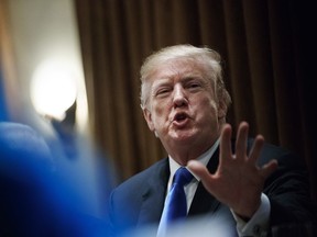 President Donald Trump speaks in the Cabinet Room of the White House, in Washington, Wednesday, Feb. 28, 2018, during a meeting with members of congress to discuss school and community safety.