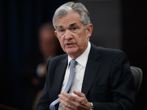 Federal Reserve Chairman Jerome Powell speaks following the Federal Open Market Committee meeting in Washington, Wednesday, March 21, 2018. The Federal Reserve is raising its benchmark interest rate to reflect a solid U.S. economy and signaling that it's sticking with a gradual approach to rate hikes for 2018 under its new chairman, Jerome Powell.