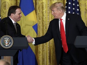 President Donald Trump shakes hands with Swedish Prime Minister Stefan Lofven during a news conference in the East Room of the White House, Tuesday, March 6, 2018, in Washington.