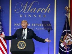 President Donald Trump speaks to the National Republican Congressional Committee March Dinner at the National Building Museum, Tuesday, March 20, 2018, in Washington.