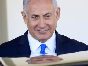 Israeli Prime Minister Benjamin Netanyahu leaves the White House, Monday, March 5, 2018, in Washington after a meeting with President Donald Trump.