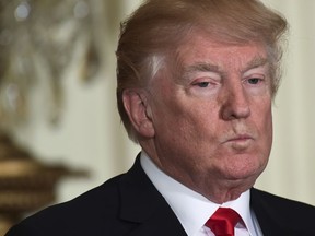 President Donald Trump listens as Swedish Prime Minister Stefan Lofven speaks during a news conference in the East Room of the White House in Washington, Tuesday, March 6, 2018.