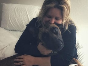 Deanna Kjorlien cuddles Havoc after finally arriving back at her home in Washington State.