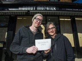 Reuben Vanderkwaak and his wife Heidi, owners of Donut Monster - where 8 windows were smashed after a reported act of vandalism in which many storefronts were targeted along Locke Street - was selling only coffee at the beginning of the day in Hamilton, Ont. on Sunday March 4, 2018. Later during the day, a line was forming outside the store once the doughnuts were made.