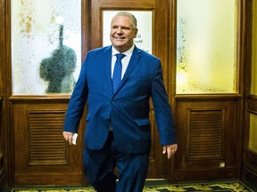 Doug Ford, newly elected leader of the Progressive Conservative Party of Ontario, leaves the party's offices at Queen's Park in Toronto after a visit on Monday, March 12, 2018.