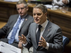 Manitoba Finance Minister Cameron Friesen delivers the 2018 budget at the Manitoba Legislature in Winnipeg on Monday March 12, 2018.