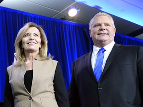 Christine Elliott and Doug Ford following a Ontario PC leadership debate on Feb. 28.