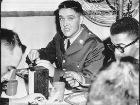 Flashback to two years in the life of soldier Elvis Presley. Elvis Presley eating cafeteria-style, in 1958 at the beginning of his army career.