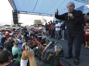Brazil's former President Luiz Inacio Lula da Silva speaks to supporters during a rally in Quedas do Iguacu, Parana state, Brazil, Tuesday, March 27, 2018. Despite his legal woes, da Silva is leading polls for the October presidential election.