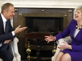 Britain's Prime Minister Theresa May meets EU Council President Donald Tusk at 10 Downing Street in London, Thursday, March 1, 2018.