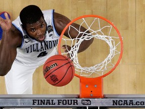 Villanova forward Eric Paschall drives to the basket during the second half against Kansas in the semifinals of the Final Four NCAA college basketball tournament, Saturday, March 31, 2018, in San Antonio.