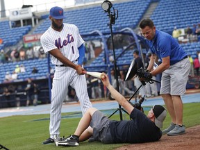 New York Mets shortstop Amed Rosario (1) poses for a photo before a spring training baseball game against the New York Yankees ,Wednesday, March 7, 2018, in Port St. Lucie, Fla.