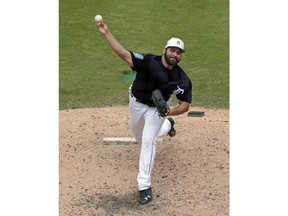 Detroit Tigers' Michael Fulmer pitches against the Atlanta Braves in the seventh inning of a spring baseball exhibition game, Sunday, March 25, 2018, in Lakeland, Fla.