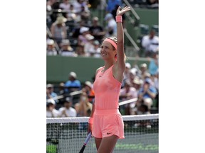 Victoria Azarenka, of Belarus, waves after defeating Catherine Bellis at the Miami Open tennis tournament, Wednesday, March 21, 2018, in Key Biscayne, Fla. Azarenka won 6-3, 6-0.