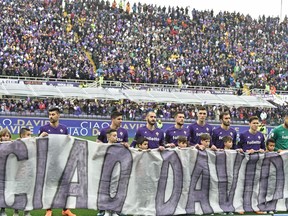 Fiorentina players hold  banner reading "Ciao Davide" (Bye Davide), prior to the Serie A soccer match between Fiorentina and Benevento, at the Artemio Franchi stadium in Florence, Italy, Sunday, March 11, 2018. The 31-year-old Astori was found dead in his hotel room last Sunday after a suspected cardiac arrest.