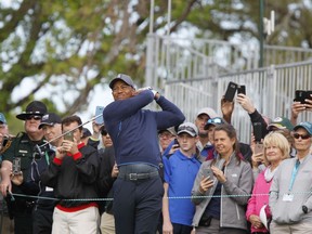 Tiger Woods tees off on the 10th hole at Innisbrook's Copperhead course during the pro-am at the Valspar Championship golf tournament, Wednesday, March 7, 2018, in Palm Harbor, Fla