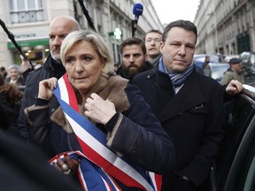 French far-right leader Marine Le Pen arrives in Paris, France, on Wednesday, March 28, 2018, to attend a silent march to honor Mireille Knoll, an 85-year-old woman stabbed to death in her apartment.