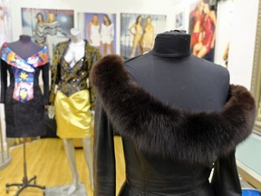 ADDS TO CLARIFY THE STYLE OF THE DRESS - This photo taken Thursday, March 15, 2018, shows West Coast Leather's vintage fox trimmed leather dress by North Beach Leather, displayed in the basement of West Coast Leather in San Francisco. San Francisco could become the largest U.S. city to ban the sale of fur items, a move that would hearten animal lovers but frustrate niche business owners who say they're fed up with a city that dictates what retailers can or can't sell. If the ban is approved by the Board of Supervisors on Tuesday, March 20, 2018, San Francisco would join two other California cities, West Hollywood and Berkeley, in saying no to a symbol of glamour that animal advocates say is built on cruelty and doesn't reflect the city's values.