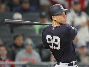 New York Yankees' Aaron Judge hits a double against the Atlanta Braves during the fifth inning of a spring training baseball game Monday, March 26, 2018, in Atlanta.